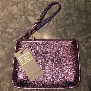 ** 2 for $15** Urban Expressions wristlet